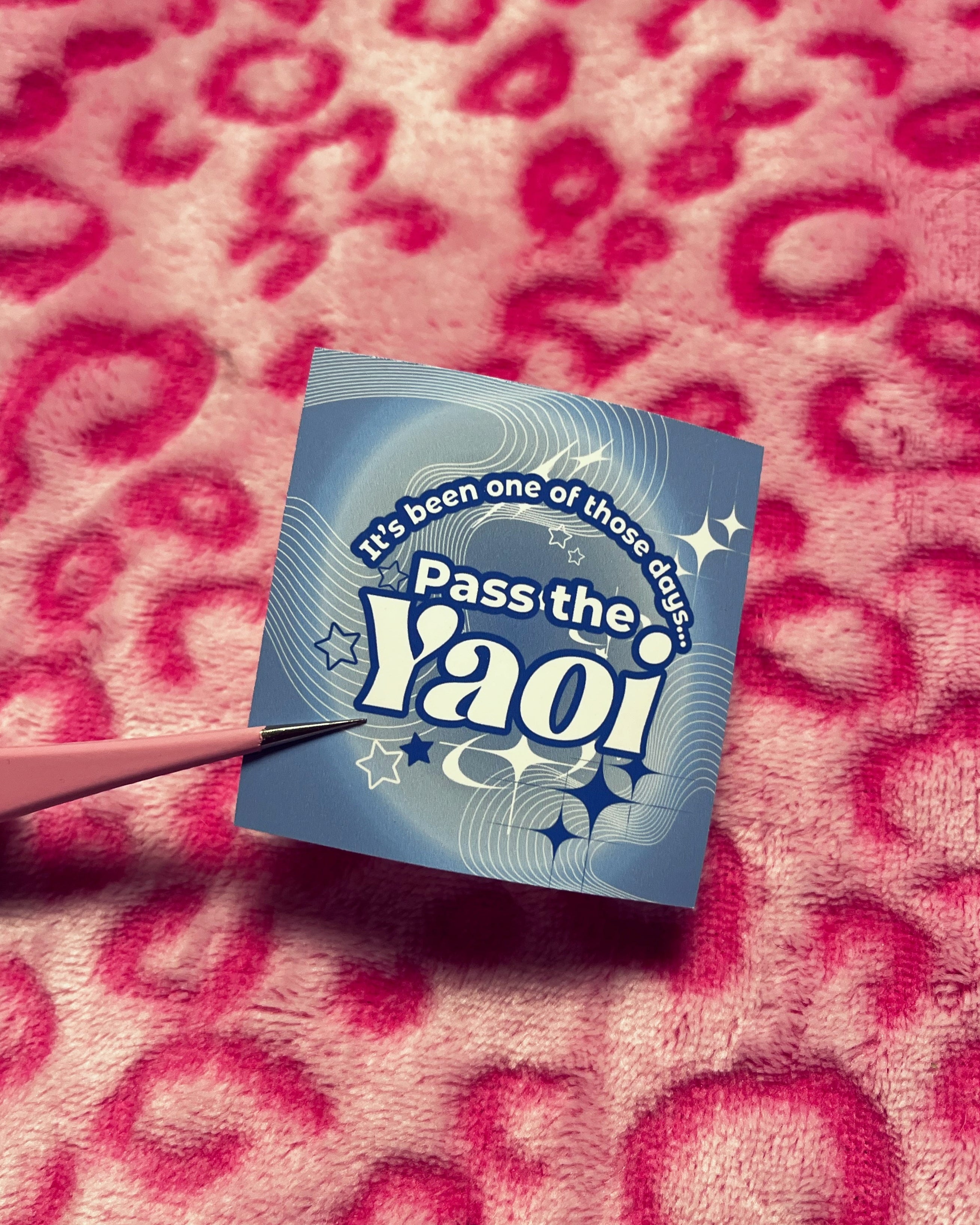 Blue card with 'Pass the Yaoi' text on a pink textured background